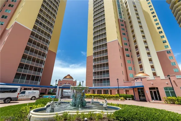 a picture of table and chairs with potted plants