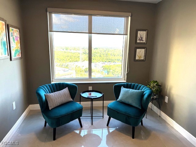 2745 First Street, Unit 1305 Fort Myers, FL 33916 - Photo 11 of 36 a living room with furniture and a window