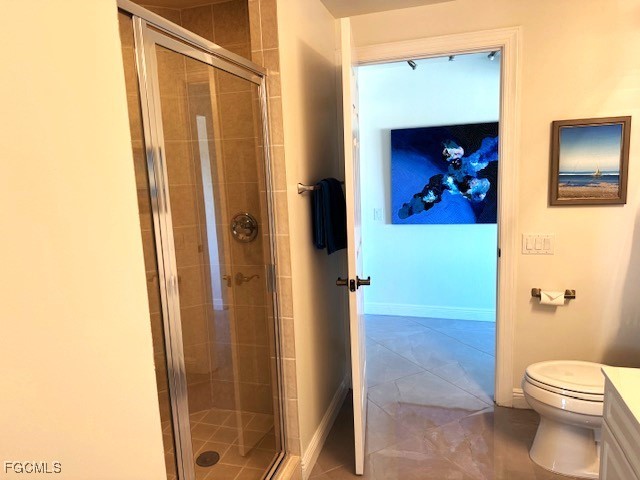 2745 First Street, Unit 1305 Fort Myers, FL 33916 - Photo 13 of 36 a bathroom with a toilet and a shower