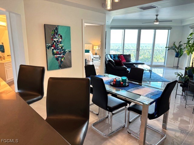 2745 First Street, Unit 1305 Fort Myers, FL 33916 - Photo 17 of 36 a living room with furniture and a large window