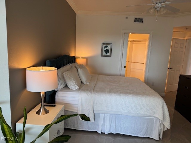 2745 First Street, Unit 1305 Fort Myers, FL 33916 - Photo 23 of 36 a bedroom with a bed a lamp and window