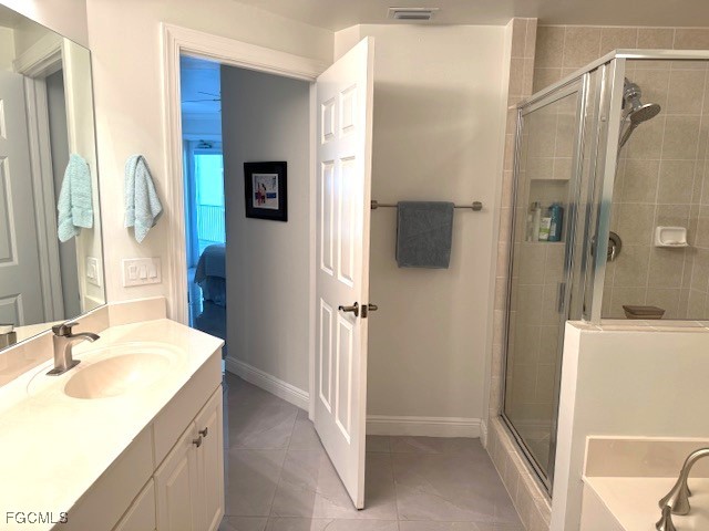 2745 First Street, Unit 1305 Fort Myers, FL 33916 - Photo 27 of 36 a bathroom with a sink and mirror