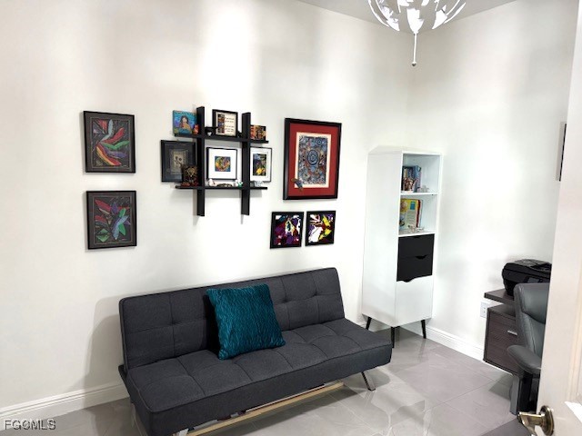 2745 First Street, Unit 1305 Fort Myers, FL 33916 - Photo 28 of 36 a living room with furniture and a flat screen tv