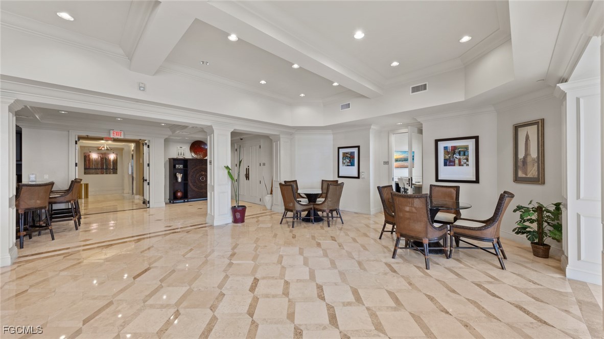 2745 First Street, Unit 1305 Fort Myers, FL 33916 - Photo 36 of 36 a living room with furniture and a wooden floor
