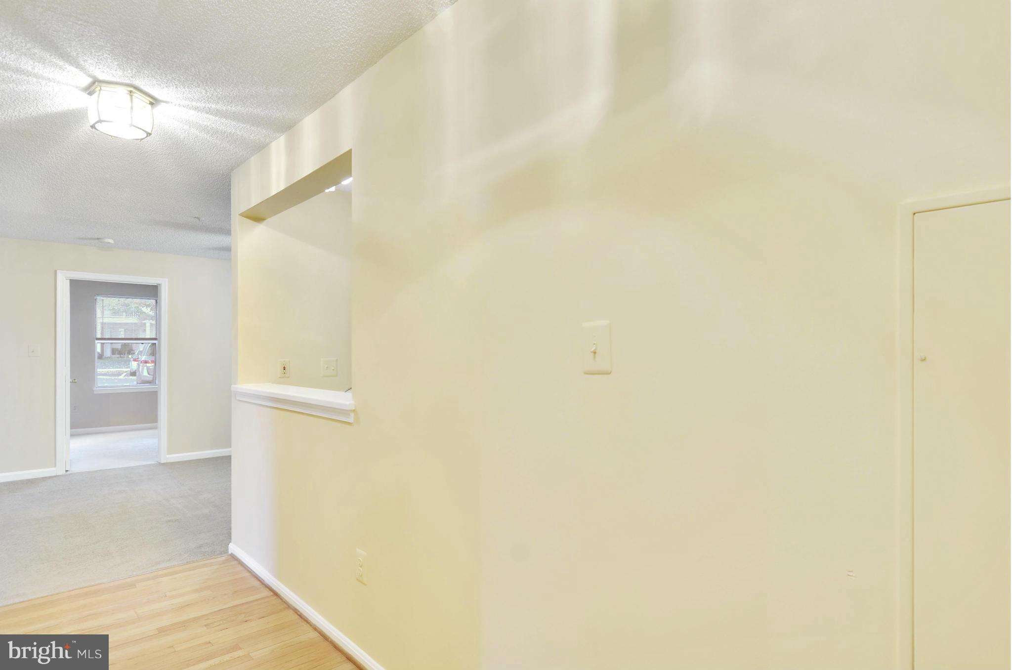 12907 Churchill Ridge Circle, Unit 86 Germantown, MD 20874 - Photo 13 of 29 Foyer looking towards the Living Room