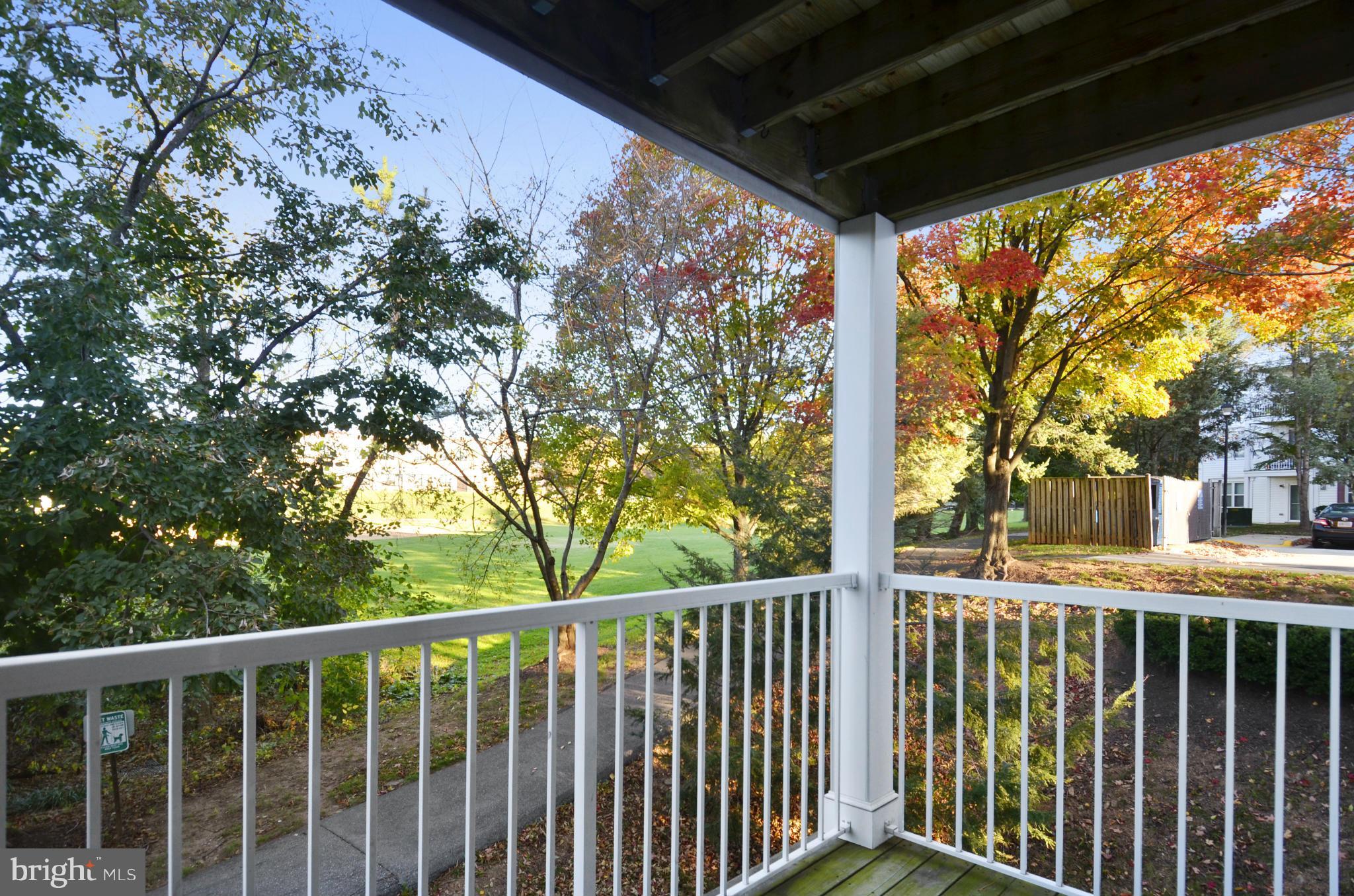 12907 Churchill Ridge Circle, Unit 86 Germantown, MD 20874 - Photo 3 of 29 Balcony off of the Living Room