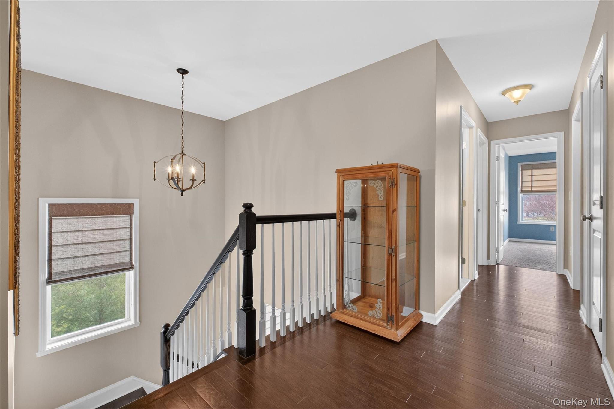 25 Hoffman Road Hopewell Junction, NY 12533 - Photo 18 of 35 a view of a hallway with wooden floor and staircase