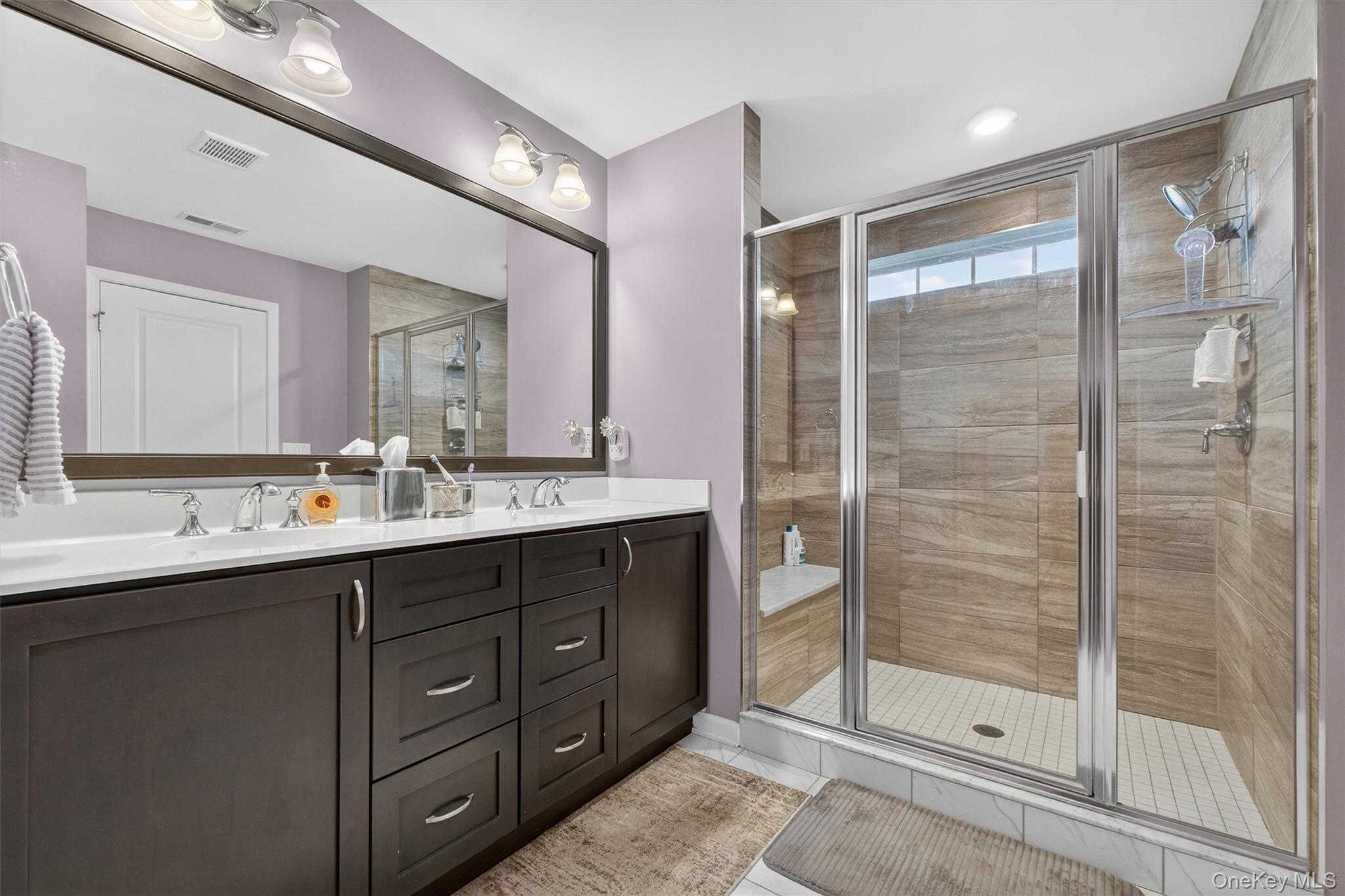 25 Hoffman Road Hopewell Junction, NY 12533 - Photo 20 of 35 a bathroom with a shower sink and mirror