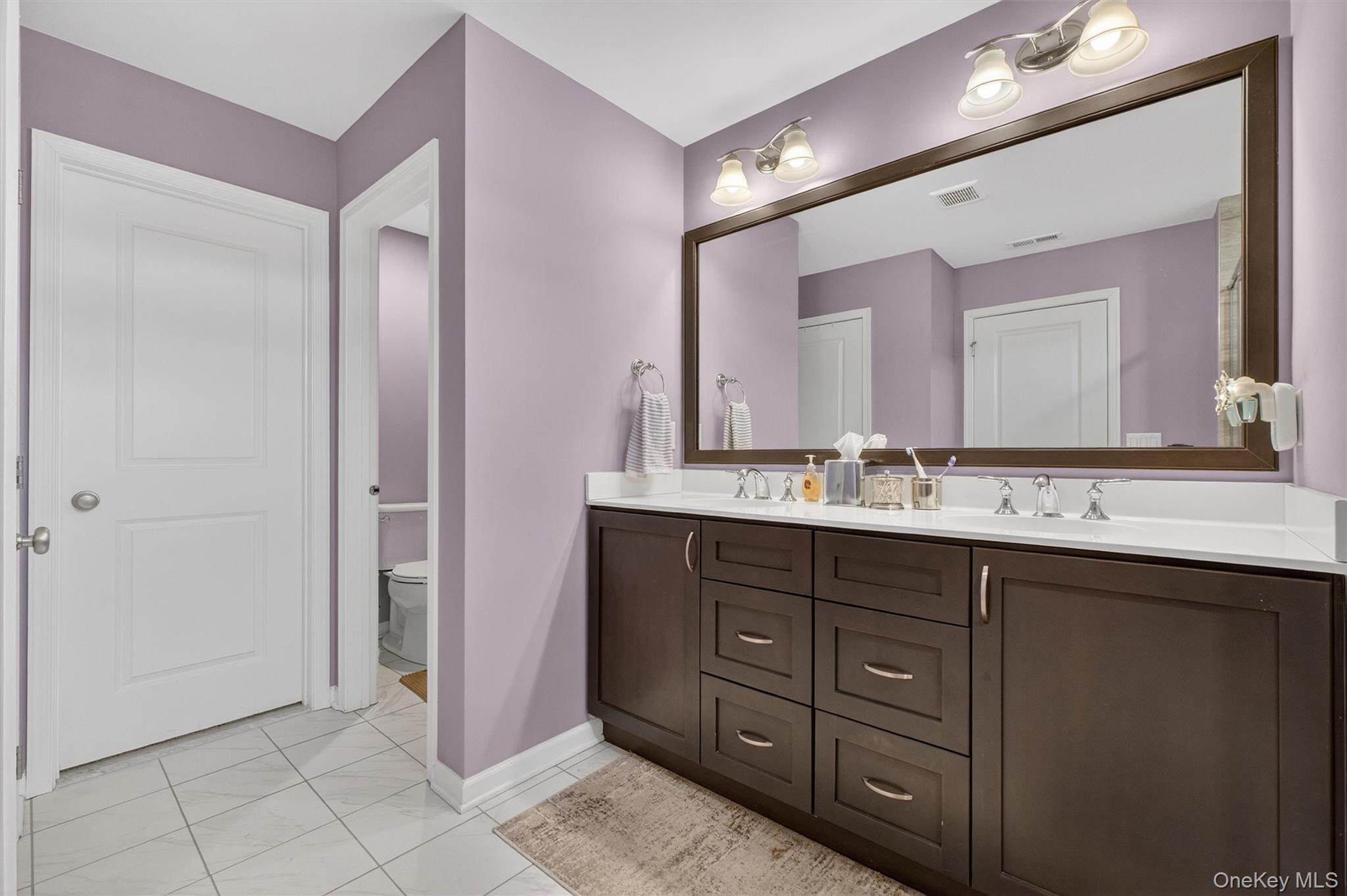 25 Hoffman Road Hopewell Junction, NY 12533 - Photo 21 of 35 a bathroom with a sink vanity and a mirror