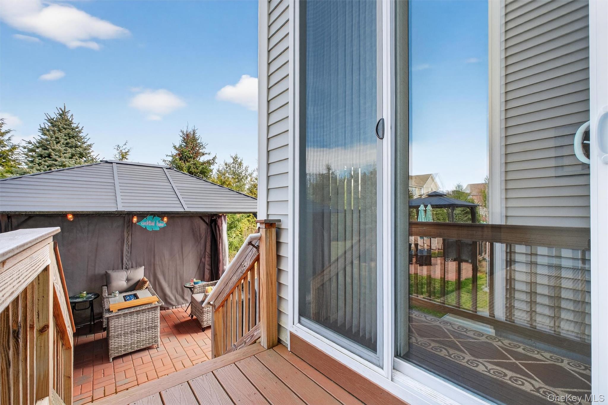 25 Hoffman Road Hopewell Junction, NY 12533 - Photo 29 of 35 a view of a balcony with chair and wooden floor