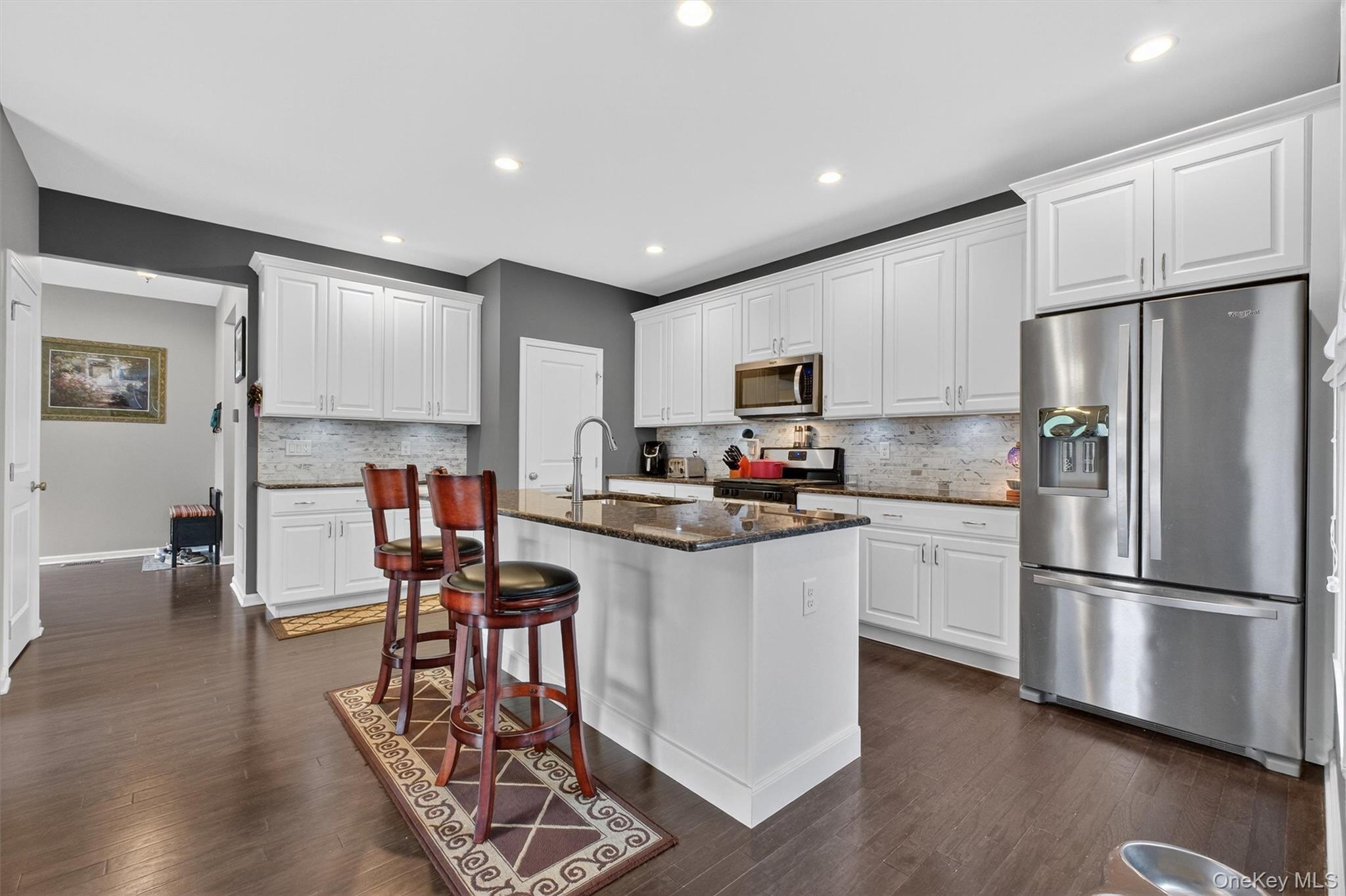 25 Hoffman Road Hopewell Junction, NY 12533 - Photo 6 of 35 a kitchen with stainless steel appliances a refrigerator sink and cabinets