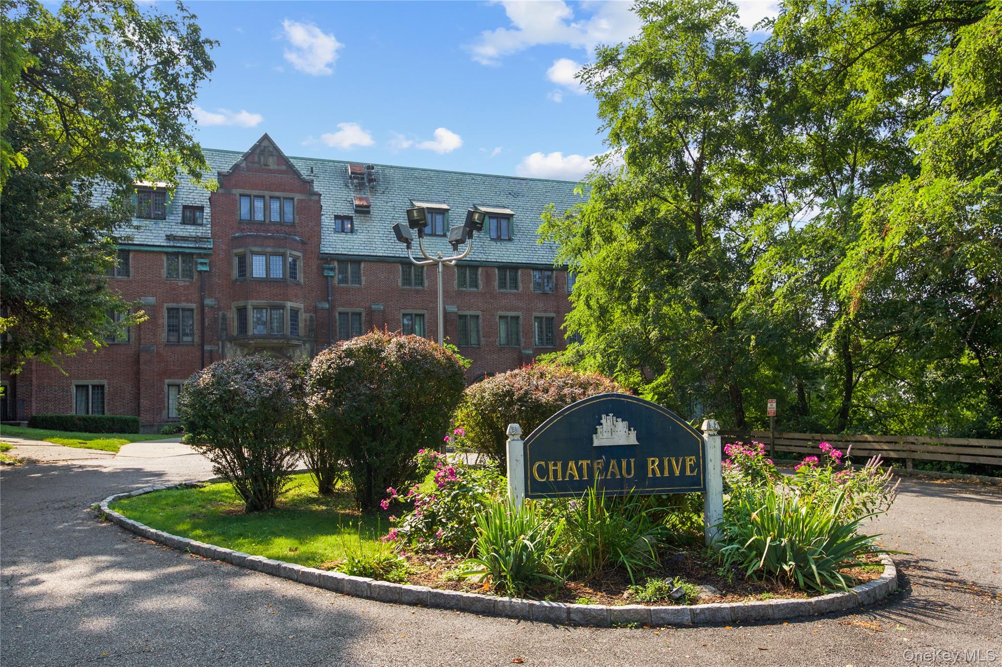 207 Chateau Rive, Unit 207 Peekskill, NY 10566 - Photo 3 of 16 View of community sign
