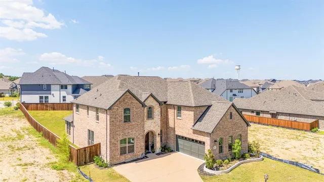 an aerial view of residential houses with wooden floor and city view