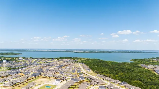 a view of a lake with a big yard