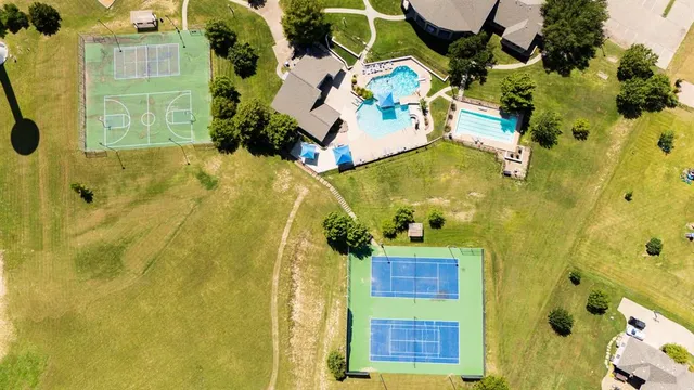 an aerial view of residential house with a swimming pool