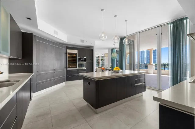 a bath tub sitting next to a bathroom sink