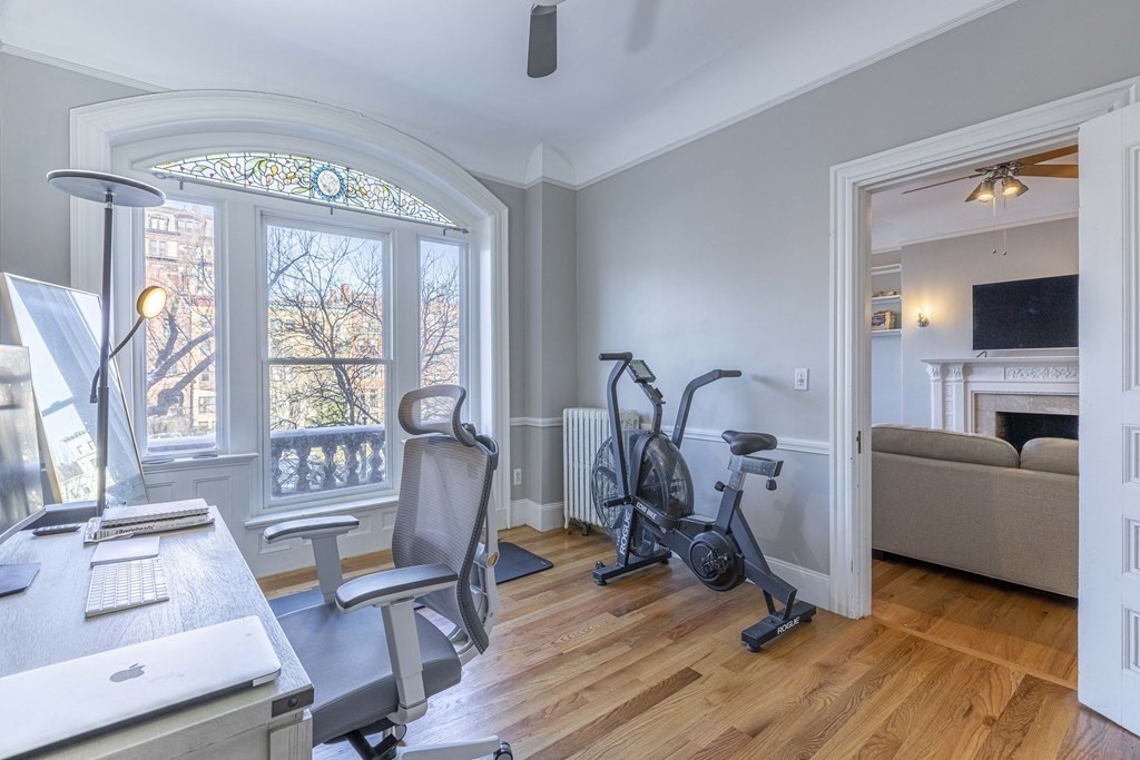 362 Commonwealth Avenue, Unit 2A Boston, MA 02115 - Photo 19 of 38 a view of a livingroom with furniture and a window