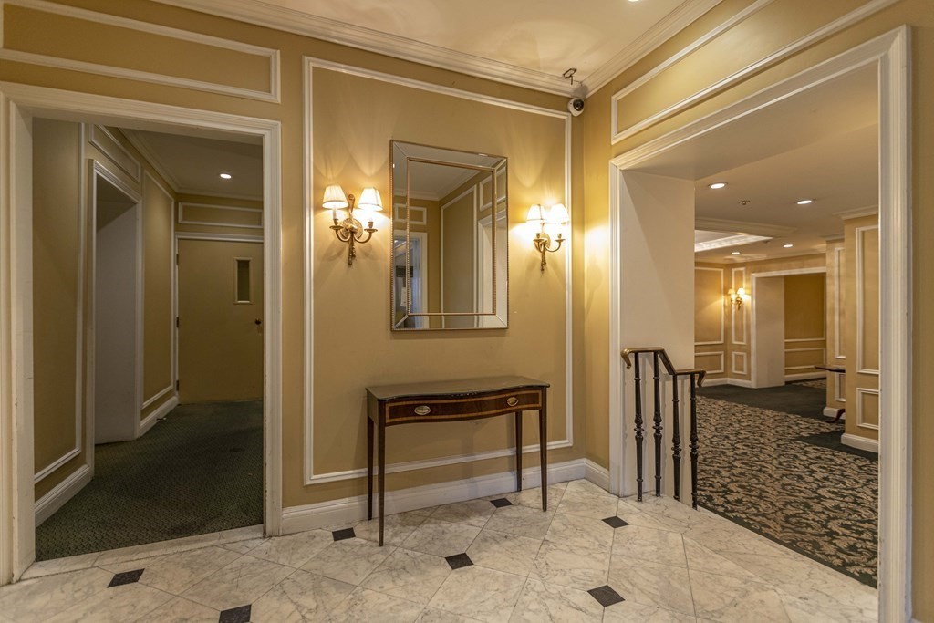 362 Commonwealth Avenue, Unit 2A Boston, MA 02115 - Photo 25 of 38 a view of a hallway that has a glass door and furniture