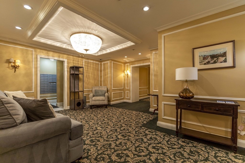 362 Commonwealth Avenue, Unit 2A Boston, MA 02115 - Photo 26 of 38 a living room with furniture and a table