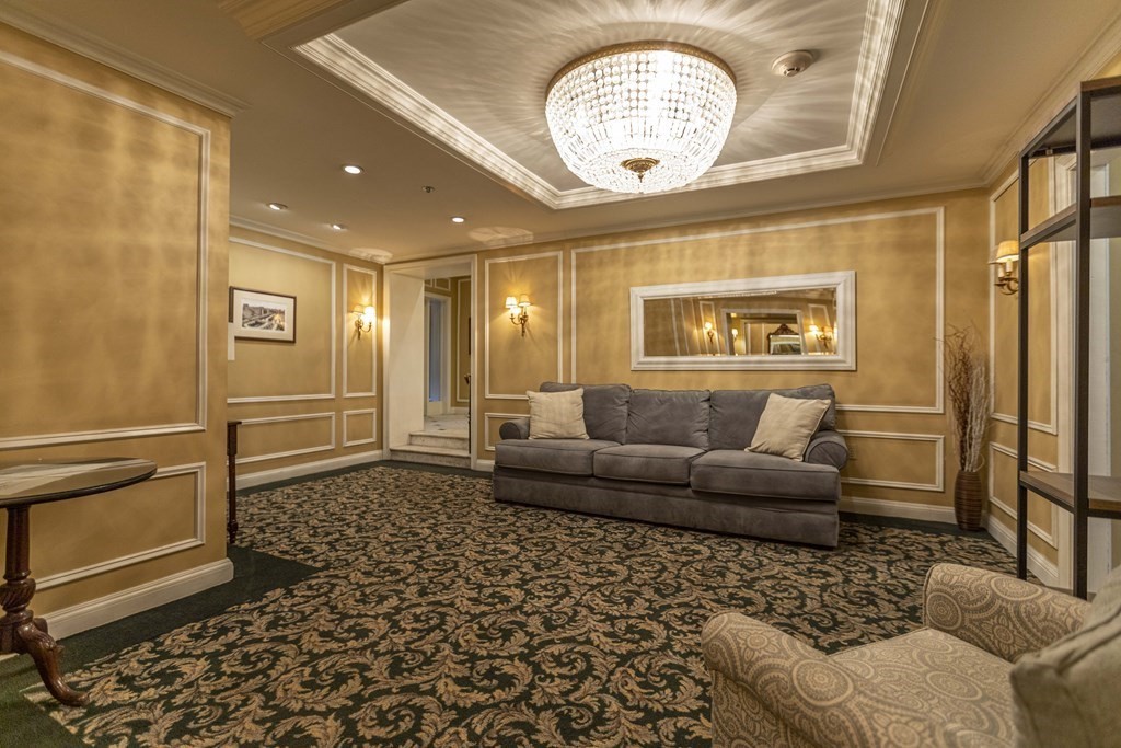 362 Commonwealth Avenue, Unit 2A Boston, MA 02115 - Photo 27 of 38 a living room with furniture and a table