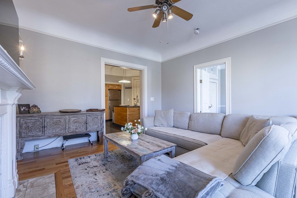 362 Commonwealth Avenue, Unit 2A Boston, MA 02115 - Photo 5 of 38 a living room with furniture and a window