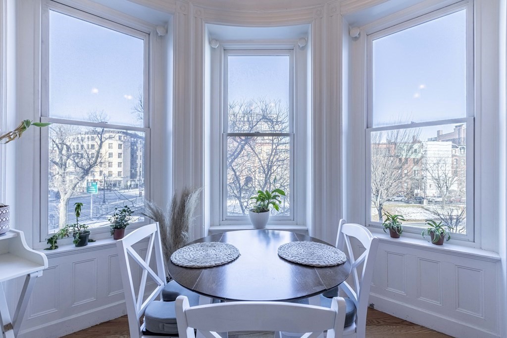 362 Commonwealth Avenue, Unit 2A Boston, MA 02115 - Photo 6 of 38 a view of a dining room with furniture window and outside view