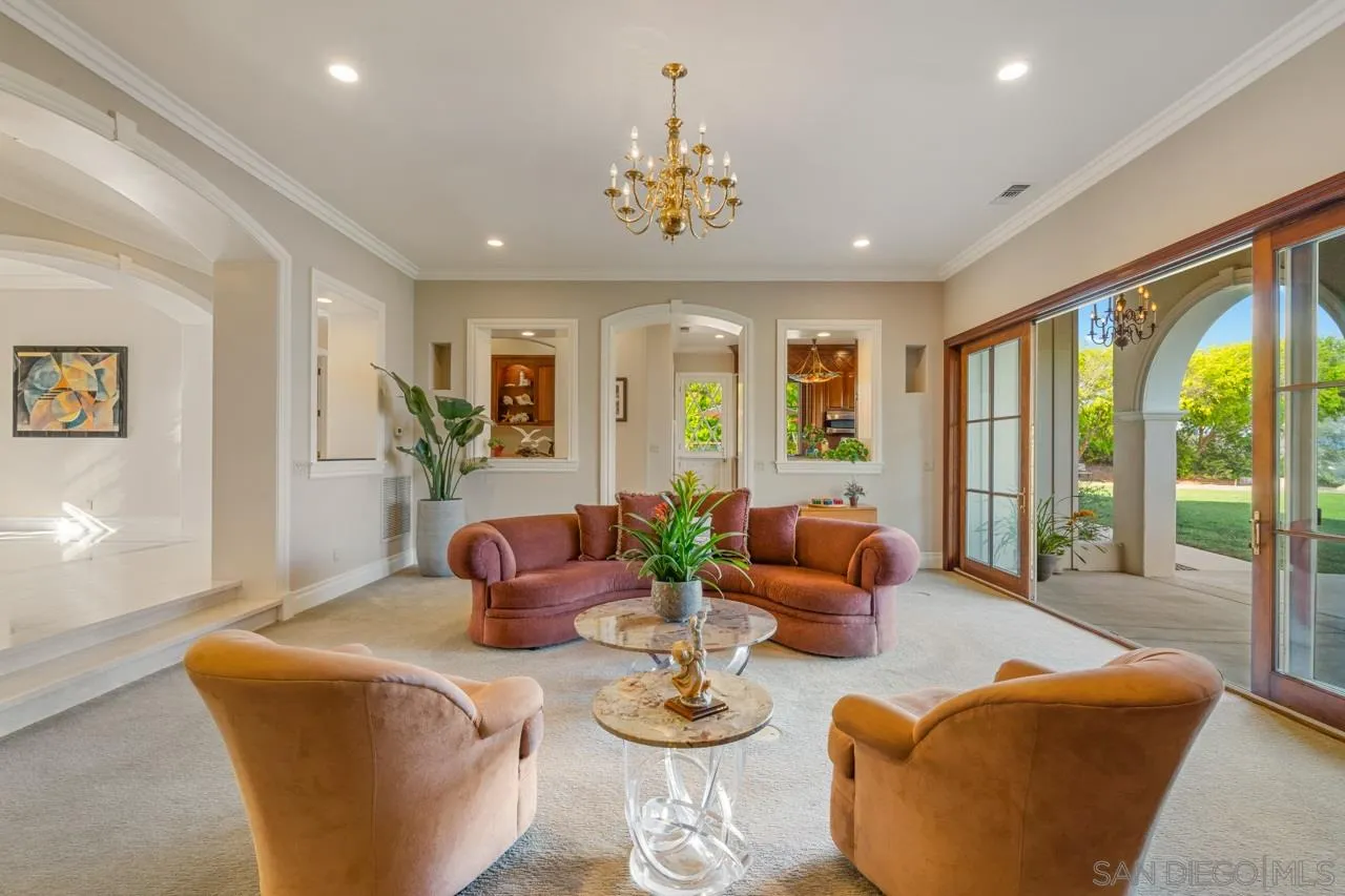 8 Rollingview Lane Fallbrook, CA 92028 - Photo 11 of 51 a living room with furniture potted plant and a large window