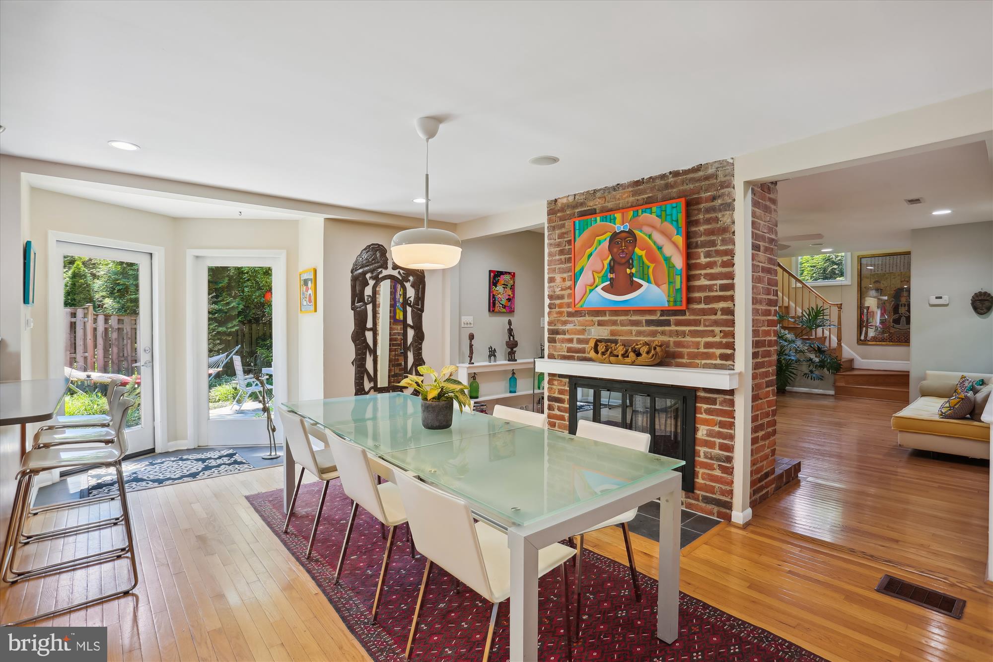 6521 East Halbert Road Bethesda, MD 20817 - Photo 13 of 52 Dining Room with a Dual Sided Fireplace