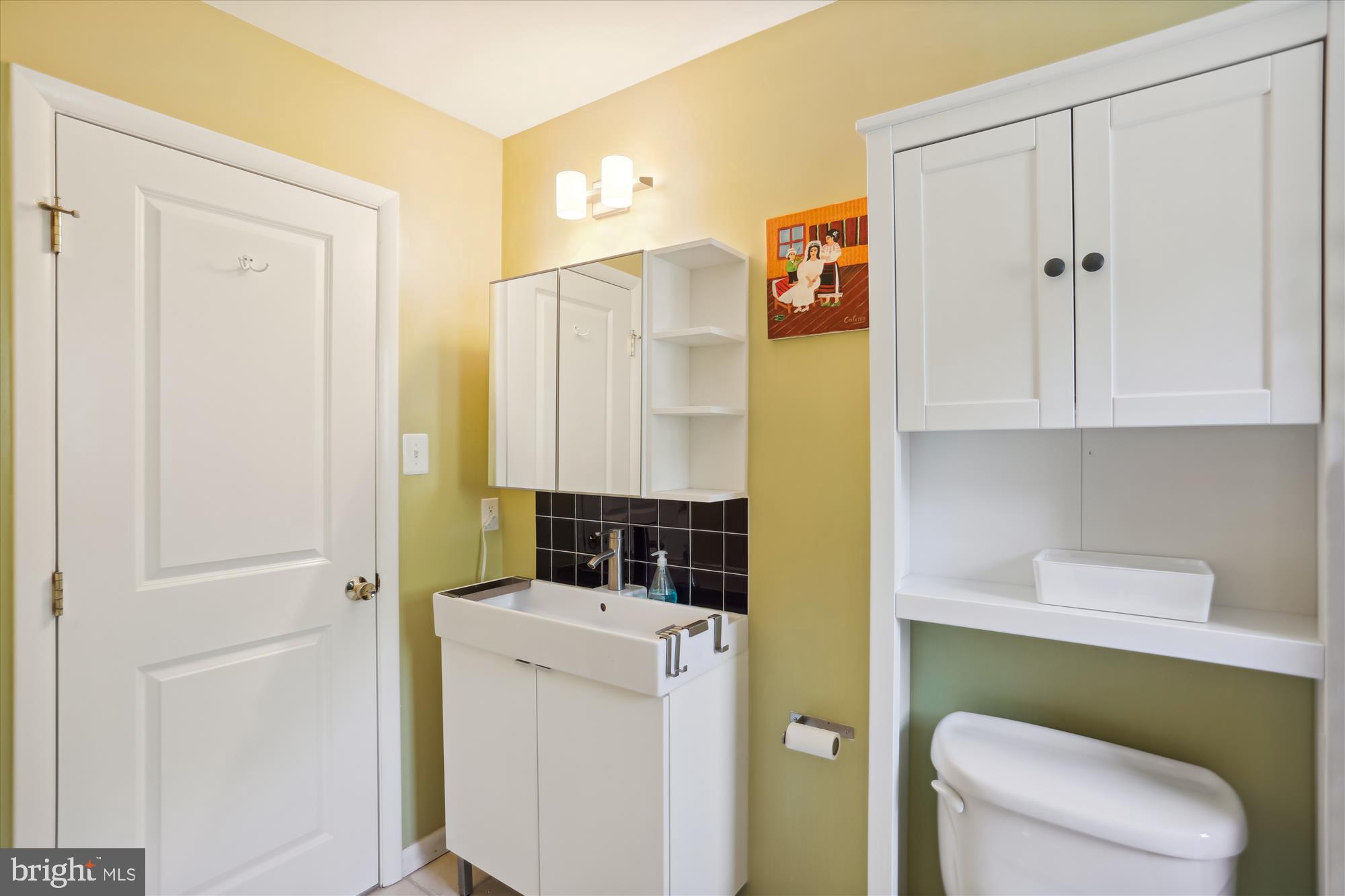 6521 East Halbert Road Bethesda, MD 20817 - Photo 35 of 52 Updated Dual Entry Bathroom