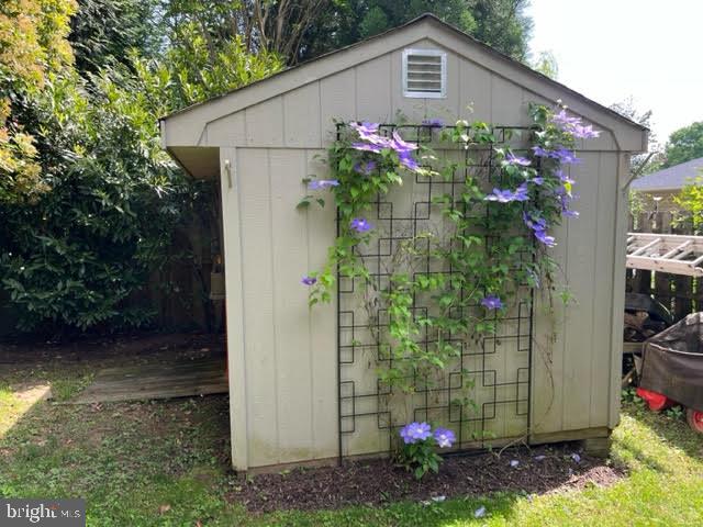 6521 East Halbert Road Bethesda, MD 20817 - Photo 46 of 52 Shed with Purple Climbing Vines