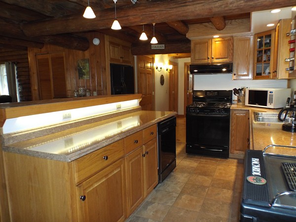 332 North Green River Road Colrain, MA 01340 - Photo 4 of 28 a kitchen with refrigerator and cabinets