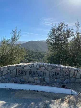a view of a yard with mountain