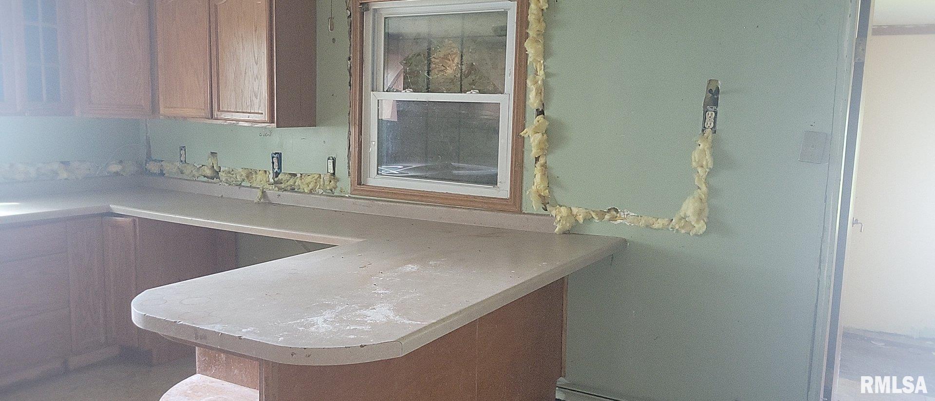 3016 Cleveland Street Clinton, IA 52732 - Photo 9 of 14 a bathroom with a sink and a vanity