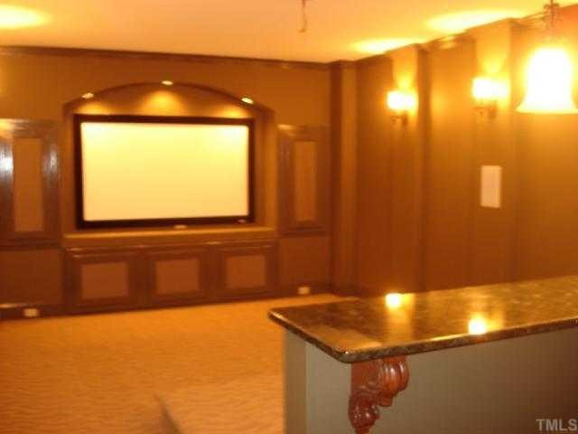 9032 Chelsea Drive, Unit LOT 6 Raleigh, NC 27603 - Photo 9 of 12 Tiered Theatre Room with large, granite wet bar & dimmer lighting galore for the true movie experience. Other