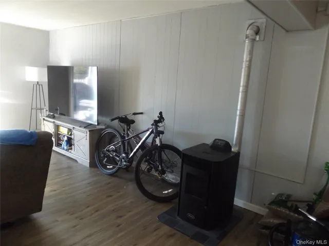 a view of workspace with wooden floor