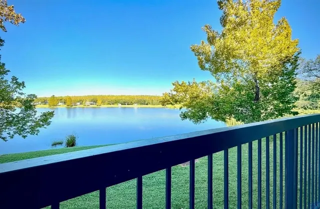 a view of lake from a balcony