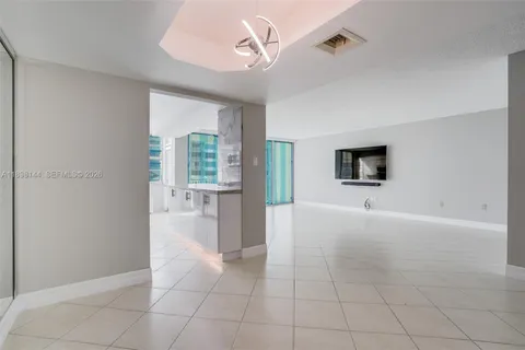 a view of an empty room with a bathroom