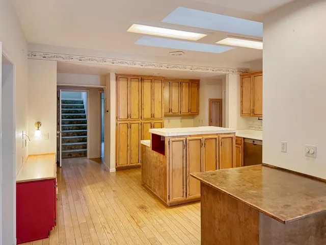 a view of kitchen with wooden floor