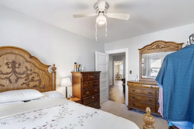 a bedroom with a bed and furniture