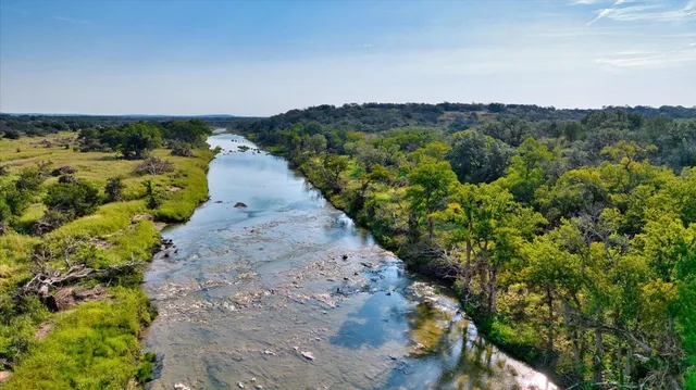 a view of a pathway with a lake