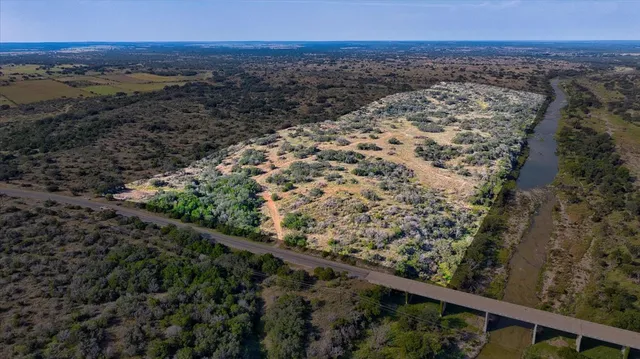 a view of a yard from a balcony