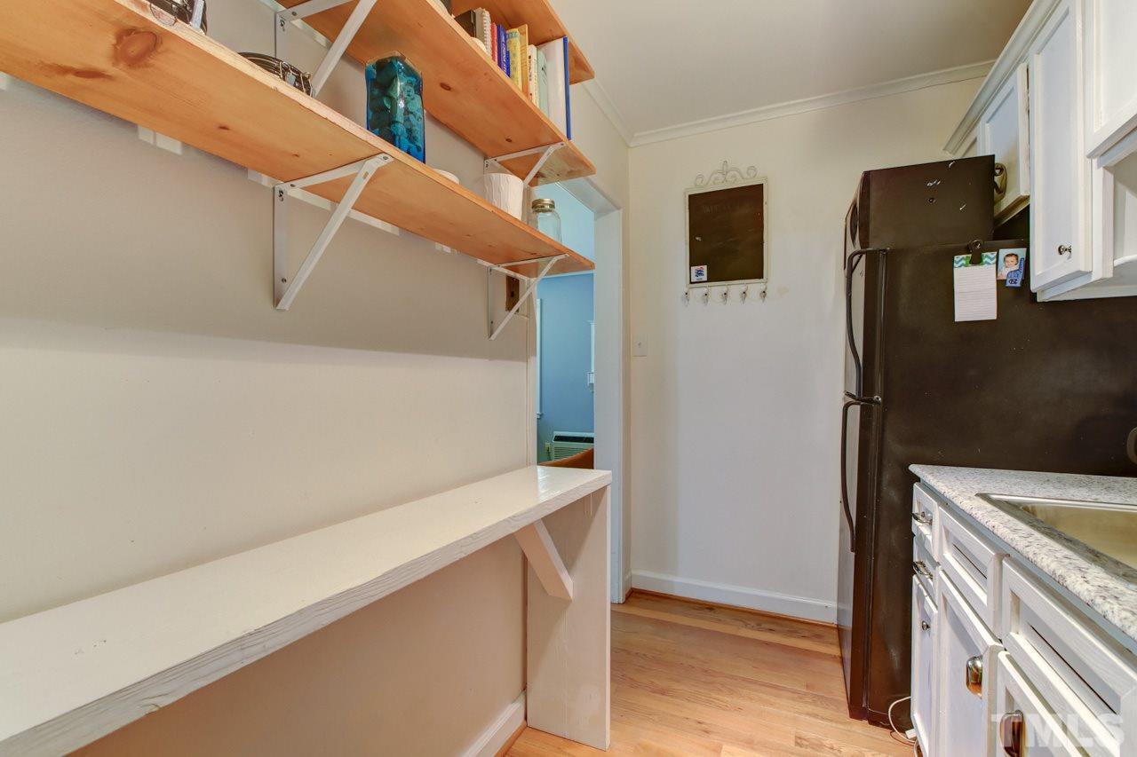 821 Daniels Street, Unit B Raleigh, NC 27605 - Photo 9 of 25 a utility room with dryer and washer