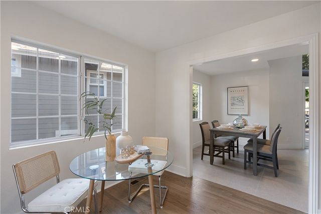 a view of a dining room with furniture window and outside view