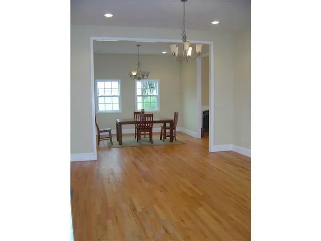 a black and white house with a outdoor space