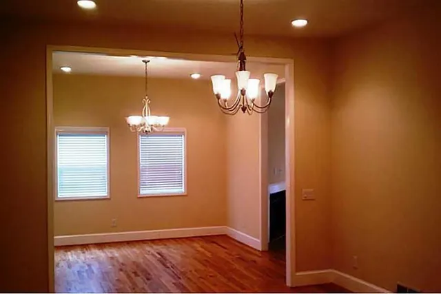 a view of a room with a chandelier