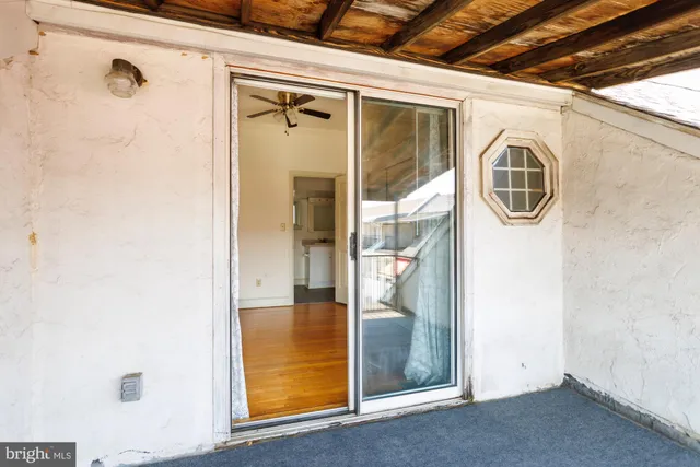 a bathroom with a mirror and a shower
