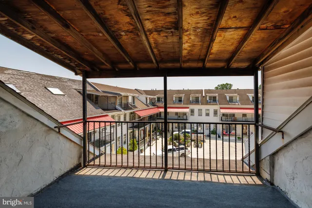 a view of a porch with furniture and a porch