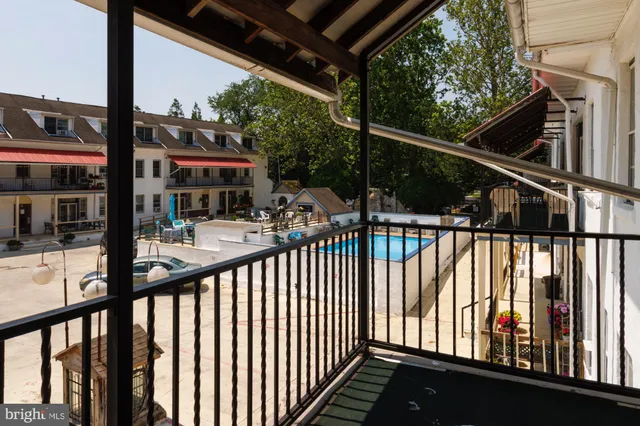 a outdoor space with lots of swings and slides