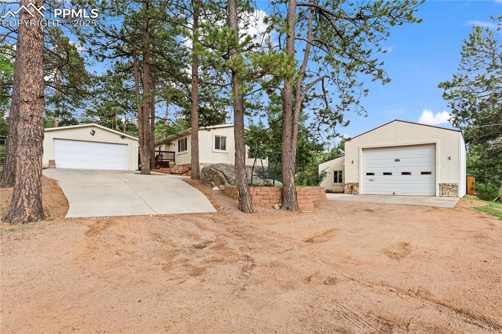 a view of a house with a snow in the yard