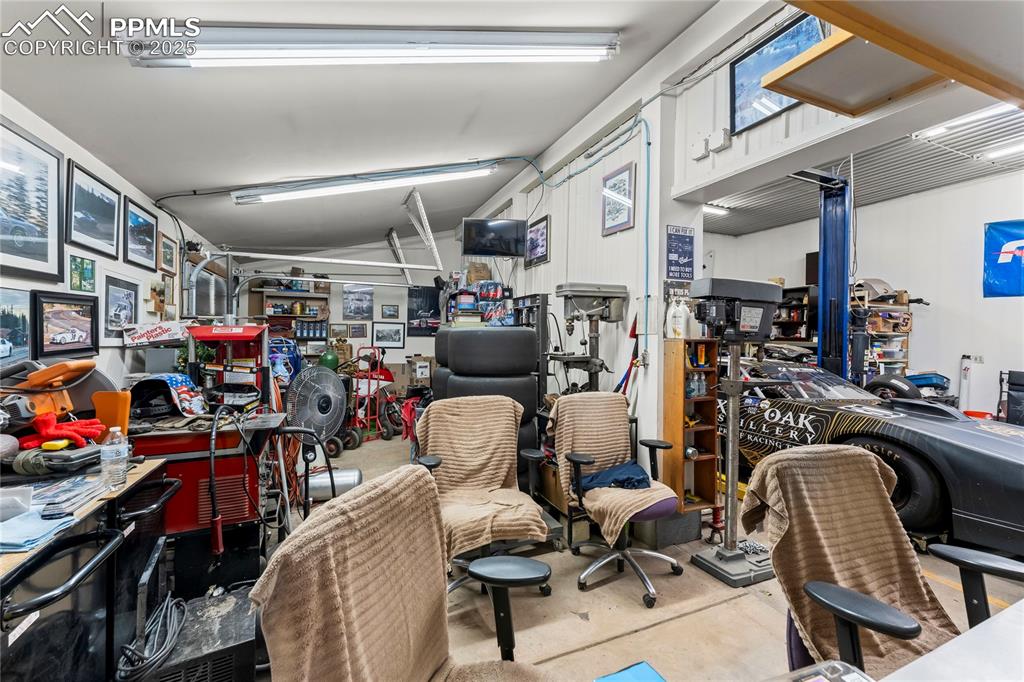 8025 Topeka Avenue Cascade, CO 80809 - Photo 12 of 42 a view of a room with gym equipment